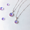 The Infinite Purity Pendant: Silver & Glass