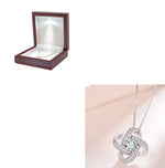 The Eternal Knot Parure: 925 Silver & Radiant Zircon