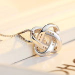 The Eternal Knot Parure: 925 Silver & Radiant Zircon