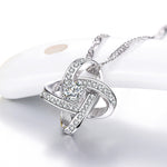 The Eternal Knot Parure: 925 Silver & Radiant Zircon