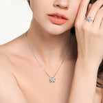 The Eternal Knot Parure: 925 Silver & Radiant Zircon