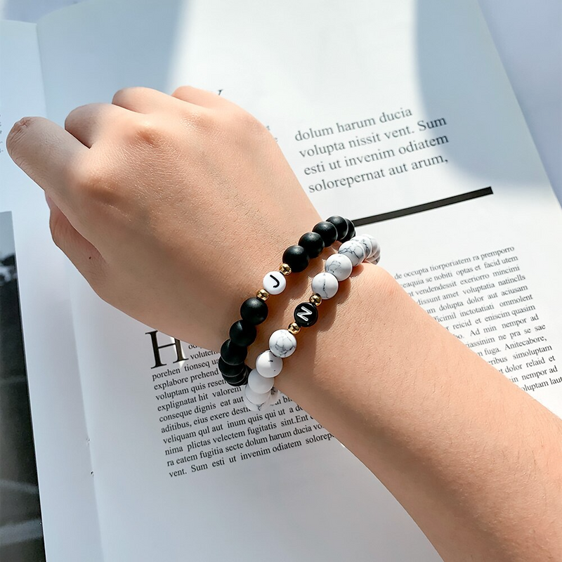 Close-up detail of Pearl bracelet with initial showing premium quality craftsmanship