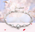 The Eternal Knot Parure: 925 Silver & Radiant Zircon