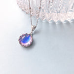 The Infinite Purity Pendant: Silver & Glass