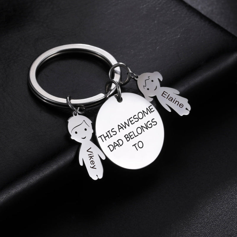 Close-up detail of Personalized keychain - This Dad belongs to showing premium quality craftsmanship