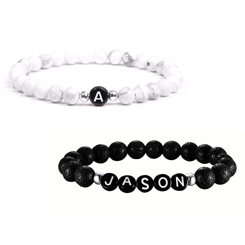 Pearl bracelet with initial with custom engraving front view - Beyond Love