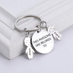 Personalized keychain - This Dad belongs to with custom engraving front view - Beyond Love