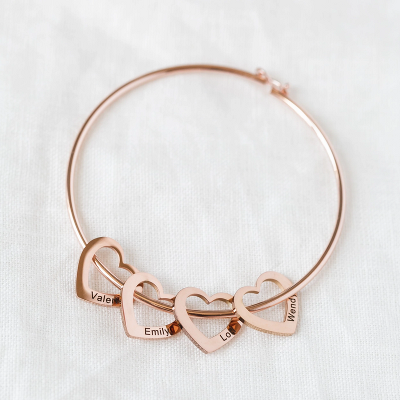 Close-up detail of Bracelet with customizable heart pendants showing premium quality craftsmanship