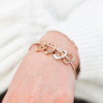 Side angle of personalized necklace Bracelet with customizable heart pendants