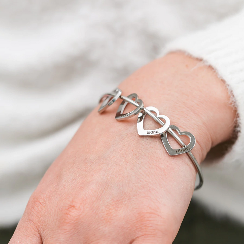 Bracelet with customizable heart pendants with custom engraving front view - Beyond Love